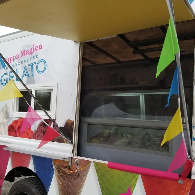 The truck's serving window with colorful bunting