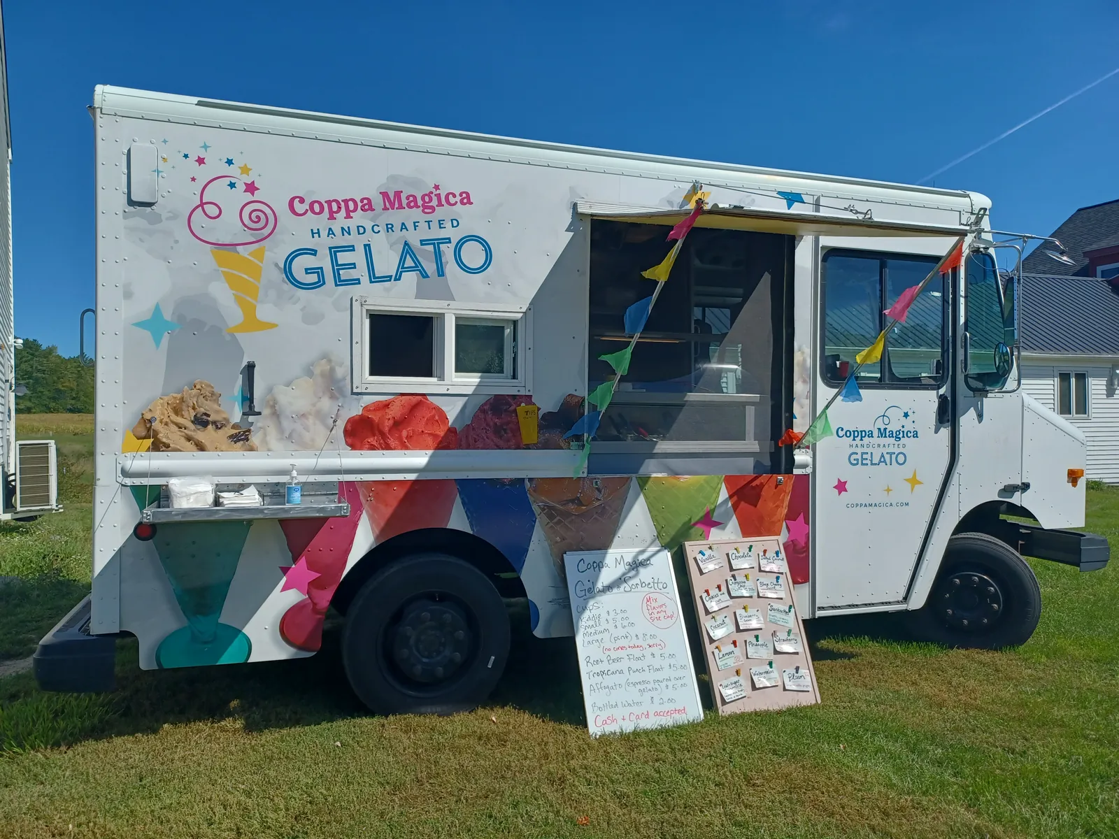 The Coppa Magica gelato truck, painted with gelato cups and stars